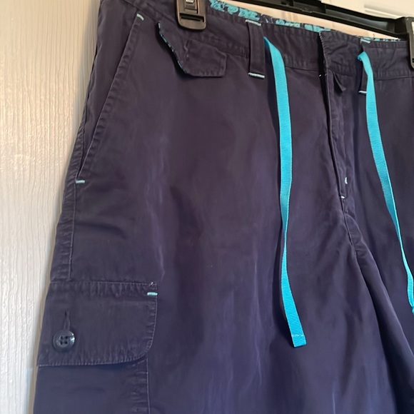 Women’s sz 12 Eddie Bauer cargo shorts Navy w/ aqua accents. Drawstring belt - Picture 2 of 10